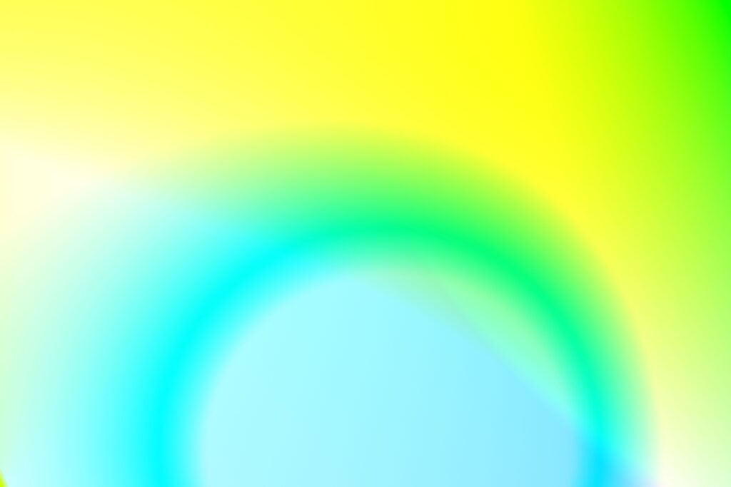 Bright and colorful gradient image with blue, green, and yellow hues.